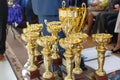 Champion golden trophies. Cup for the first place Royalty Free Stock Photo