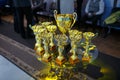 Champion golden trophies. Cup for the first place Royalty Free Stock Photo