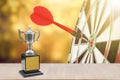 Champion trophy placed on wooden table. Royalty Free Stock Photo