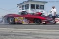 Corvette drag car making burnout on the track Royalty Free Stock Photo