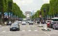 Champs Elysee avenue and Triumphal arch Arc de Triomphe in Paris, France Royalty Free Stock Photo