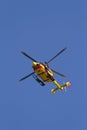 Rescue copter on a blue sky background vertical view