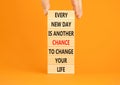 Chance to change symbol. Concept words Every new day is another chance to change your life on blocks on a beautiful orange Royalty Free Stock Photo