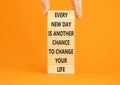 Chance to change symbol. Concept words Every new day is another chance to change your life on blocks on a beautiful orange Royalty Free Stock Photo