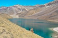 Chandartaal lake under high mountains in the spiti valley , himachal pradesh india