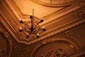 Chandelier on a beautiful baroque ceiling. ceiling in the museum