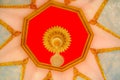 A chandelier on a ceiling in a hall in a Buddist temple Royalty Free Stock Photo