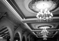 chandelier, dark interior with lamp, architectural monument, Vintage chandelier,luxury retro style on dark background,black and w Royalty Free Stock Photo