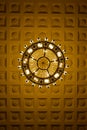 Chandelier on decoarted ceiling Royalty Free Stock Photo