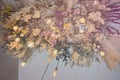 Chandelier of flowers on the ceiling, ceiling lamps, grass, yellow bulbs, grass flowers, purple flowers, pink flowers,