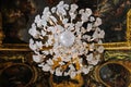 Chandelier in the Hall of Mirrors in the Museum of the History of France in the impressive Palace of Versailles, France