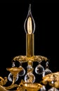 Chandelier for interior of the living room. chandelier details isolated on black background. One candle Royalty Free Stock Photo