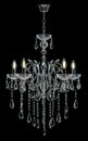 Chandelier for interior of the living room. Large silver crystal chandelier isolated on black background Royalty Free Stock Photo