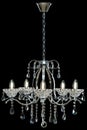 Chandelier for interior of the living room. Large silver crystal chandelier isolated on black background Royalty Free Stock Photo