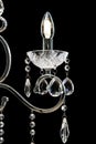 Chandelier for interior of the living room. Large silver crystal chandelier isolated on black background Royalty Free Stock Photo