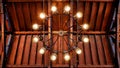 Chandelier under a wooden roof Royalty Free Stock Photo