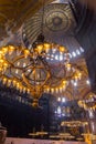 Chandeliers, domes and murals in magnificent and beautiful famous Hagia Sophia mosque