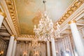 Chandeliers hanging under a ceiling. Interiors of the Polovtsov mansion - Architect`s house, St.Petersburg, Russia Royalty Free Stock Photo