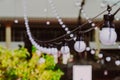 Chandeliers lined up in beautiful lines, outdoors, conveying a sense of luxury and dreaminess Royalty Free Stock Photo