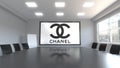 Chanel logo on the screen in a meeting room. Editorial 3D rendering