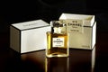 Chanel No 5 french perfume parfum bottle box isolated dark background Royalty Free Stock Photo