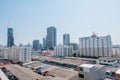 Chang glass buildings in Bangkok city with blue sky background showing its design and traffic. Bangkok, Thailand April 14, 2018