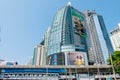 Chang glass buildings in Bangkok city with BTS skytrain foreground and blue sky background showing its design and traffic. Bangkok