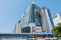 Chang glass buildings in Bangkok city with BTS skytrain foreground and blue sky background showing its design and traffic. Bangkok