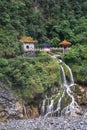 Changchun Temple or Eternal Spring Shrine with Waterfall at Taroko Gorge National Park in Taiwan. Vertical Photo Royalty Free Stock Photo