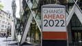 Change Ahead 2022 on a city-center sign in front of a modern office building Royalty Free Stock Photo