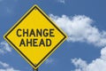Change Ahead yellow warning sign with sky Royalty Free Stock Photo