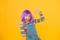 Change color. Fantasy hair trend. Kid girl with bright vibrant hairstyle. Artificial wig concept. Pigment dye hair Royalty Free Stock Photo