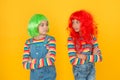 Change color. Kids girls with vibrant hairstyle. Pigment dye hair. Freedom for expression. Fantasy hair trend. Sisters Royalty Free Stock Photo