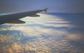 The change of day and night in flight above the clouds in the plane at an altitude Royalty Free Stock Photo