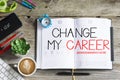 Change my career is the plan for the future with agenda and office supplies on wooden desk