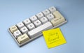 Change password. Keyboard with letters qwerty and yellow office sticker on a blue background. 3d render