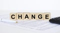Change word concept written on wooden cubes blocks Royalty Free Stock Photo