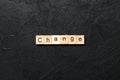 CHANGE word written on wood block. CHANGE text on cement table for your desing, concept Royalty Free Stock Photo