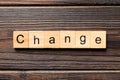 CHANGE word written on wood block. CHANGE text on wooden table for your desing, concept Royalty Free Stock Photo