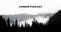 Change your life is shown using the text under the silhouette of mountains Royalty Free Stock Photo