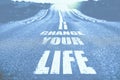 Change your life written on road. Toned. Royalty Free Stock Photo