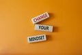 Change your mindset symbol. Concept words Change your mindset on wooden blocks. Beautiful orange background. Business and Change Royalty Free Stock Photo