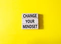 Change your mindset symbol. Concept words Change your mindset on wooden blocks. Beautiful yellow background. Business and Change Royalty Free Stock Photo