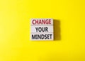 Change your mindset symbol. Concept words Change your mindset on wooden blocks. Beautiful yellow background. Business and Change Royalty Free Stock Photo