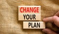 Change your plan symbol. Concept words Change your plan on wooden blocks on a beautiful canvas table canvas background. Royalty Free Stock Photo