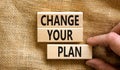 Change your plan symbol. Concept words Change your plan on wooden blocks on a beautiful canvas table canvas background. Royalty Free Stock Photo