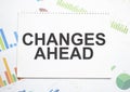 Changes Ahead a text label in the planning Notepad, and a statistics chart. Market analysis, successful business strategy Royalty Free Stock Photo