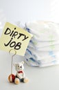 Changing diapers is a dirty job Royalty Free Stock Photo