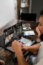 Changing the Hard drive with cd rom inside laptop at home. DIY project at home. Life skill for Royalty Free Stock Photo