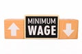 Changing Minimum wage rate trend goes down or up. Royalty Free Stock Photo